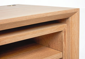 detailed view of the beveled face on the cascade desk. Custom designed bevel face was specific request from the customer. also shows details of the open storage area.